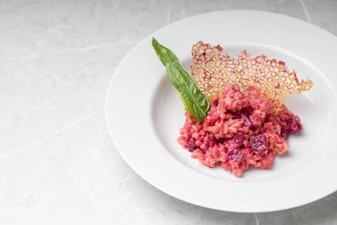 Beetroot risotto. Italian pink risotto Stock Photos