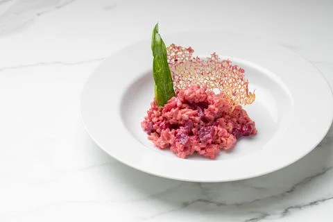 Beetroot risotto. Italian pink risotto Stock Photos