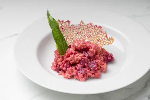 Beetroot risotto. Italian pink risotto Stock Photos