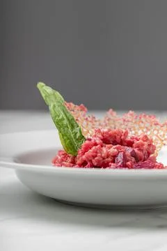 Beetroot risotto. Italian pink risotto Stock Photos