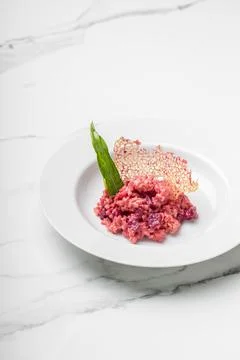 Beetroot risotto. Italian pink risotto Stock Photos