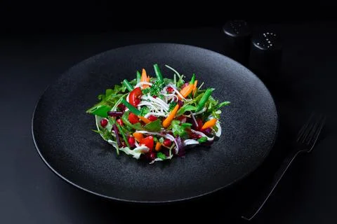 Beetroot roca and pomegranate salad dish Stock Photos