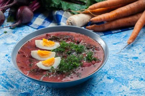 Beetroot soup served with boiled egg Stock Photos