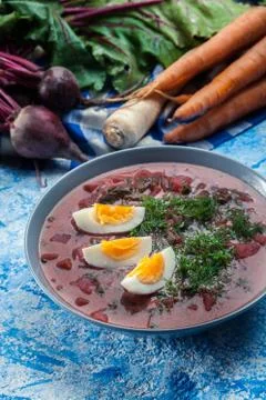 Beetroot soup served with boiled egg Stock Photos