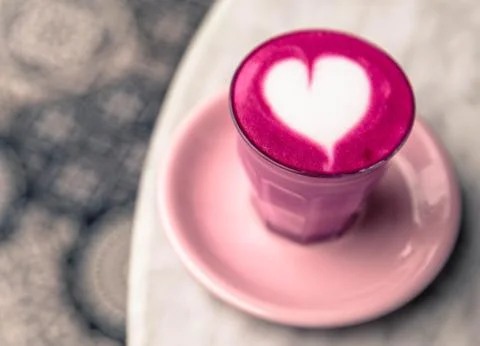 Beetroot super latte on marble background. Photos
