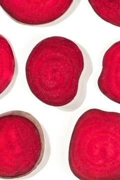 Beetroot texture. Slices of beet, shot from the top on a white background Stock Photos