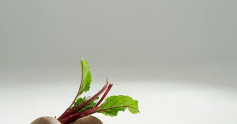 Beetroots with leaves isolated on white background 4K 4k Stock Footage 84154259
