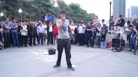 Beg in the street singing Stock Footage 48271593