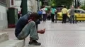 Beggar and people on the street in Athens, Greece HD Footage