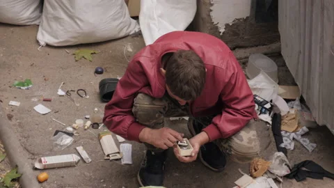 Beggar Man Searches Something In Garbage Stock Footage 163638925