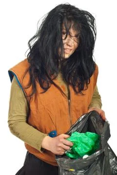Beggar searching garbage Stock Photos