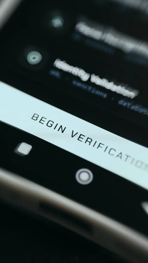 Begin Identity Verification - Focused Mobile Display Stock Footage 336947284