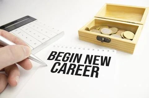 BEGIN NEW CAREER words on a small piece of paper. Concept for business. Stock Photos