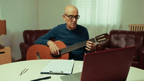 Beginner Guitarist Learning How To Tune Guitar Stock Footage 291192109
