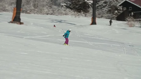 Beginner Skier riding down an empty ski resort in Hakuba Japan Stock Footage 166372952