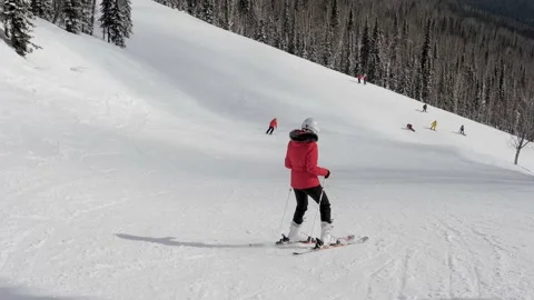 Beginner Skier Skiing Down The Slope Of The Track On The Mountain In Winter Video stock 156514510