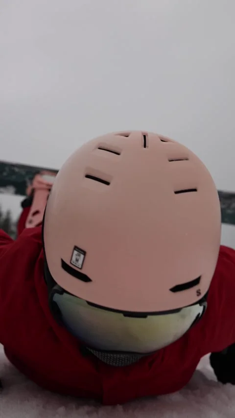 Beginner snowboarder falls close up on snowy slope during winter training Stock Footage 327092338