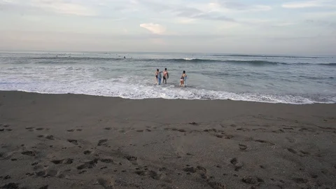 Beginners going to learn to surf Stock Footage 126030059