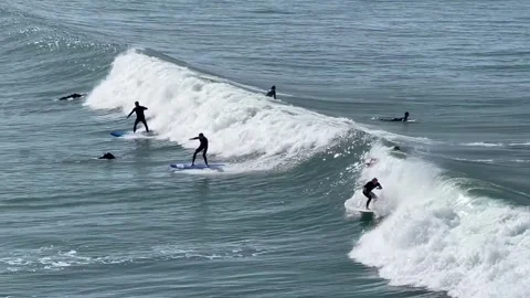 Beginners learn surfing at Atlantic Ocean in Morocco, Agadir Stock Footage 248666338