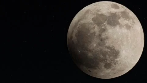 The beginning of the Blood Moon Eclipse of 2014 Stock Photos