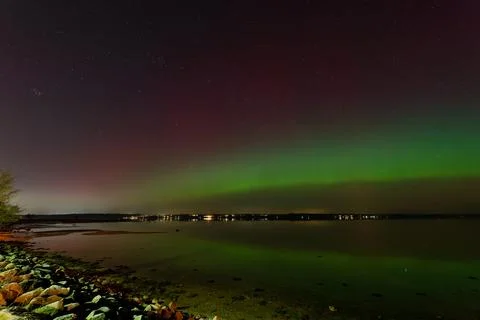 Beginning panoramic Aurora Borealis Over Flensburg Fjord View from Solitued.. Stock Photos
