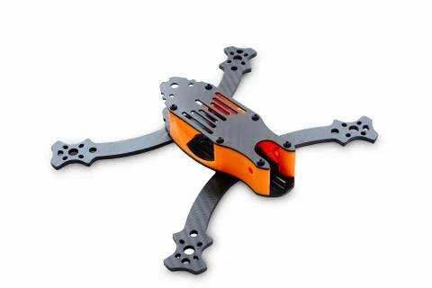 The beginning of the racing drone assembly. Durable frame of an unmanned aeri Stock Photos