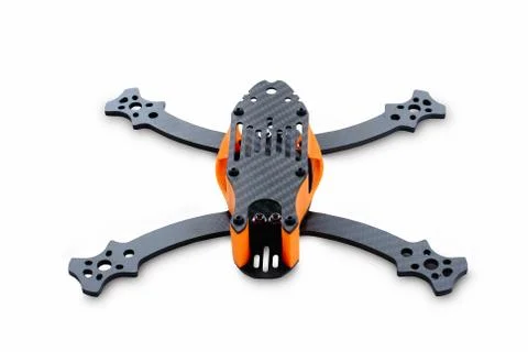 The beginning of the racing drone assembly. Durable frame of an unmanned aeri Stock Photos