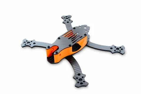 The beginning of the racing drone assembly. Durable frame of an unmanned aeri Stock Photos