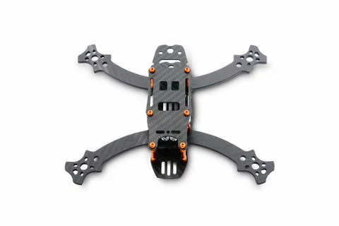 The beginning of the racing drone assembly. A robust frame of an unmanned aer Stock Photos
