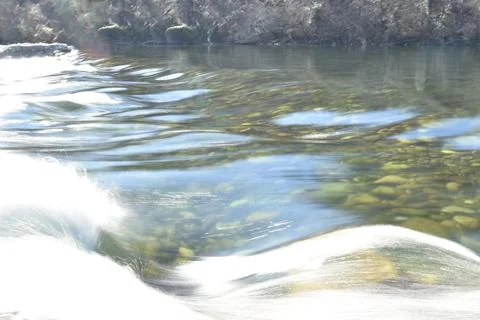 Beginning of the rapids of a river Stock Photos