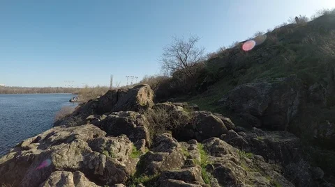 The beginning of spring. A warm sunny day overlooking the cliffs on the  River Stock Footage 127424098