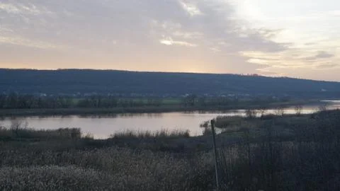 Beginning of sunset over the river Stock Photos