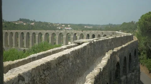 Beginning of a walking path on top of an Aqueduct, with a total of 58 arcs. Stock Footage 162587796