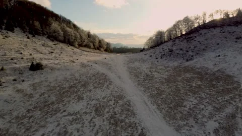 The beginning of winter in a beautiful landscape with a sunset of splendor Stock Footage 166919560