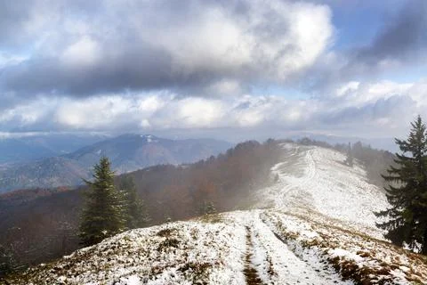Beginning of winter in the mountains 스톡 사진