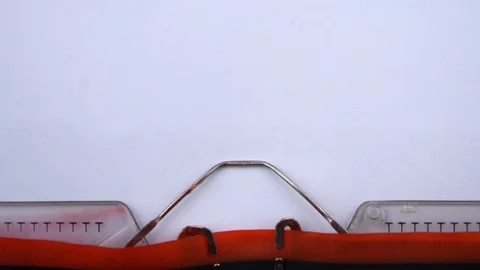 Beginning - word printed on an old typewriter in red letters, close up. Stock Footage 126777194