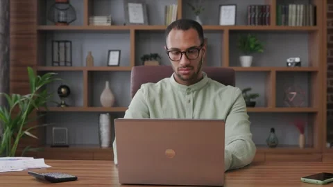 The beginning of the working day. Portrait of confident mixed race businessman Video stock 244646169