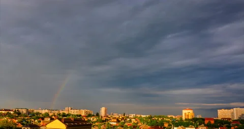 Begins a rainbow against the backdrop of the cityscape Stock Footage 90487204