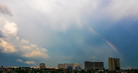 Begins a rainbow against the backdrop of the cityscape Stock Footage 112181729