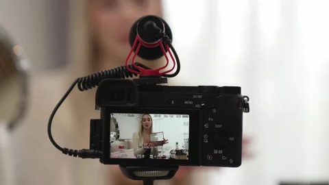 Behide camera screen display woman making beauty tutorial video. Blithe Stock Footage 278332341