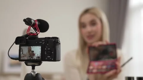 Behide camera screen display woman making beauty tutorial video. Blithe Stock Footage 279103567