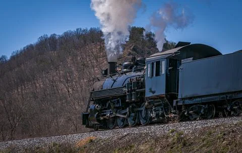 Behind and Slightly Lower View of an Approaching Restored Narrow Gauge Passenger Foto stock