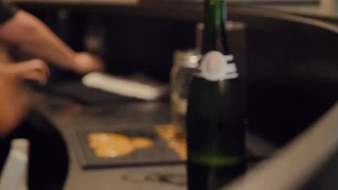 Behind the bar making mimosas and giving to customer Stock Footage 115732002