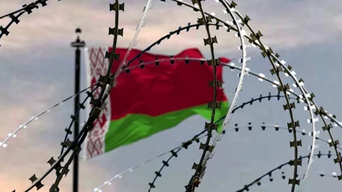 Behind barbed wire flag of Belarus against the sky, 3d rendering. Concept: inter Stock Footage 255502774