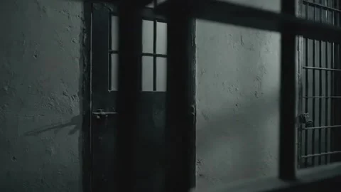 Behind Bars: Gritty Prison Cell Door and Window Stock Footage 313246332