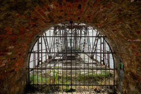 Behind the bars, locked into the cave 스톡 사진