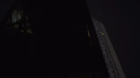 Behind Black Skyscraper reflection with glass windows at business district in Stock-Footage 119368082