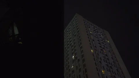 Behind Black Skyscraper reflection with glass windows at business district in 스톡 동영상 119368175