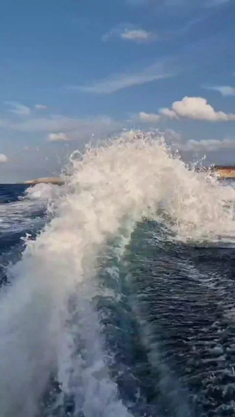 Behind the Boat Waves Form and Follow in This Captivati Stock Footage 289648271
