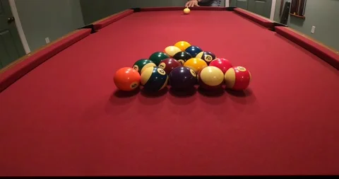 Behind  a Break Shot Low POV on Pool Table Stock Footage